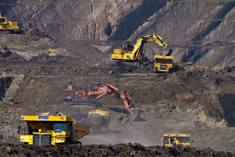 diggers and dumper trucks at mine